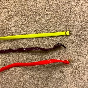 Trio of colorful Patent leather belts size small.